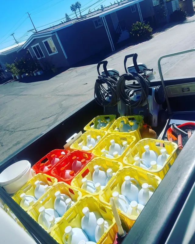 Truck bed loaded with chlorine and pool service supplies